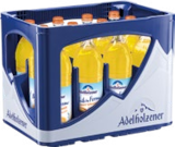 Huster Moßbach - Adelholzener Angebot im Prospekt Adelholzener bei Huster im Moßbach Prospekt für 8,99 €