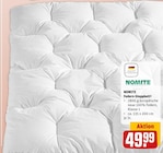 Federn-Steppbett³ im Angebot bei REWE in Gießen Federn-Steppbett³ Angebote von NOMITE bei REWE Gießen für 49,99 €