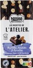 Tablette de chocolat noir aux myrtilles, amandes et noisettes Les Recettes de l’Atelier - Nestlé dans le catalogue Monoprix
