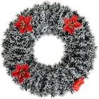 Couronne de porte à 3,99 € dans le catalogue Carrefour