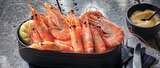 Crevettes cuites label rouge en promo chez Intermarché Express Versailles à 2,49 €