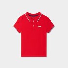 Polo manches courtes coton Creeks rouge garçon en promo chez La Halle Polo manches courtes coton Creeks rouge garçon dans le catalogue La Halle