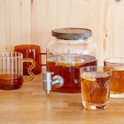 Distributeur en verre et acacia à B&M dans Marmont-Pachas