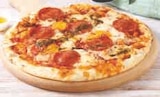 Pizza jambon champignons mozzarella ou raclette lardons oignons ou 4 fromages ou chorizo poivrons à U Express dans Longnes