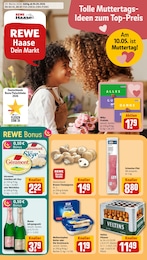 REWE Prospekt mit 33 Seiten