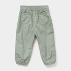 Pantalon ballon poches plaquées vert kaki bébé fille dans le catalogue La Halle