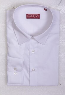 Stokomani Échirolles - LA CHEMISE Promo LA CHEMISE dans le catalogue Stokomani "Dernière ligne droite avant les fêtes !!" à Échirolles
