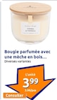 Bougie parfumée avec une mèche en bois en promo chez Action Saint-Herblain à 3,99 €