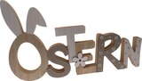 dm-drogerie markt Leer - Holzschriftzug "Ostern" mit Hasenohren Angebot im Prospekt Holzschriftzug "Ostern" mit Hasenohren bei dm-drogerie markt im Leer Prospekt für 5,95 €