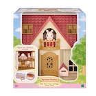 Poupée Sylvanian Families Le Cosy Cottage Du Village dans le catalogue Fnac