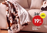 Plaid effet peau de vache à 19,99 € dans le catalogue Maxi Bazar