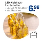 LED-Holzhaus-Lichterkette für 6,99 € bei Rossmann im Angebot LED-Holzhaus-Lichterkette im aktuellen Rossmann Prospekt