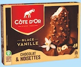 Bâtonnet de glace à la vanille enrobé de chocolat et noisettes x4 - Côte d'Or en promo chez Intermarché Bâtonnet de glace à la vanille enrobé de chocolat et noisettes x4 - Côte d'Or dans le catalogue Intermarché