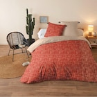 Parure de lit 2 personnes 220x240cm réversible motifs et pompons en promo chez Gifi Dieppe à 14,00 €