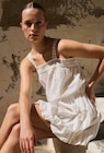 Robe courte cintrée unie en coton BIO GOTS en promo chez Monoprix Margaret Robe courte cintrée unie en coton BIO GOTS dans le catalogue Monoprix Margaret