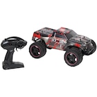 Monstertruck RC télécommandé à Action dans La Tâche