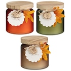 Bougie couvercle bois en promo chez B&M Bougie couvercle bois dans le catalogue B&M