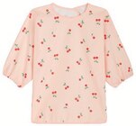 Bavoir tablier imprimé fermeture velcro - babycalin en promo chez Hyper U Saintes à 6,90 €