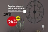 Pendule vintage métal noir dans le catalogue Maxi Bazar