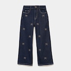 Jean large brodé noeud coton denim brut fille - La Halle Jean large brodé noeud coton denim brut fille à 19,99 € dans le catalogue La Halle