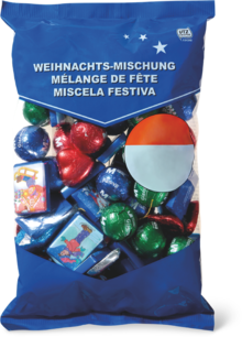 Migros France Marignier - Mélange de fête Promo Mélange de fête dans le catalogue Migros France "Chocolatez votre Noël !" à Marignier