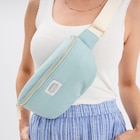 Sac banane bandoulière en toile canvas vert pastel femme dans le catalogue La Halle