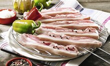 Porc poitrine tranchée avec os à griller - Casino Supermarchés à Bordeaux Porc poitrine tranchée avec os à griller en promo chez Casino Supermarchés Bordeaux à 4,50 €